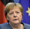 Меркел защити политиката си по отношение на Русия и бежанците