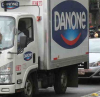 Le Figaro: Напускането на Русия ще коства на Danone милиард евро