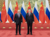 Най-висшият китайски дипломат Ван И увери Путин, че други страни не могат да влияят на отношенията им